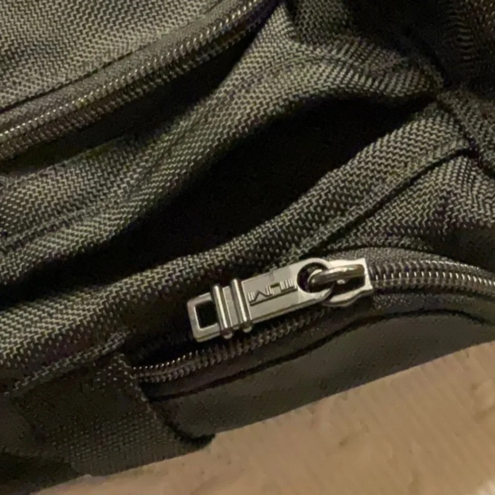 Tumi Alpha or Alpha 3 Men's Backpack, Multi Pockets, Adj Straps. Luggage tag.